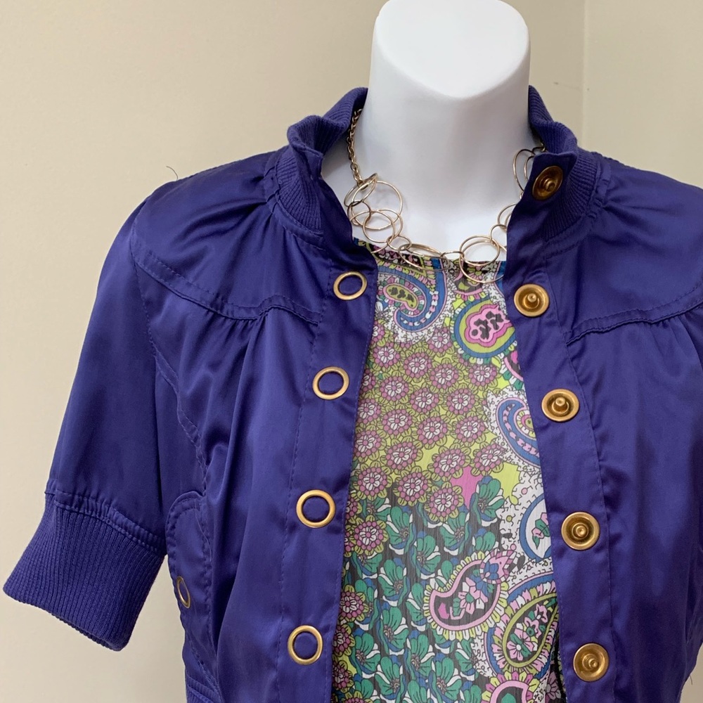Purple satin crop jacket with brass grommet detail